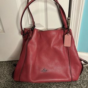 Reddish pink coach purse